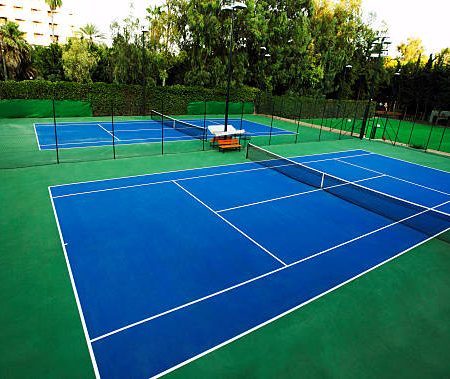 Est-ce que la météo locale a une influence sur la rénovation court de tennis à Lyon ?